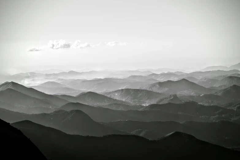 the view from a high altitude point of a mountain range