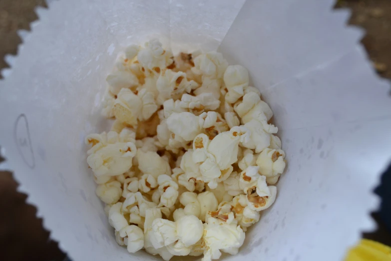 a popcorn bag with some kind of white substance inside