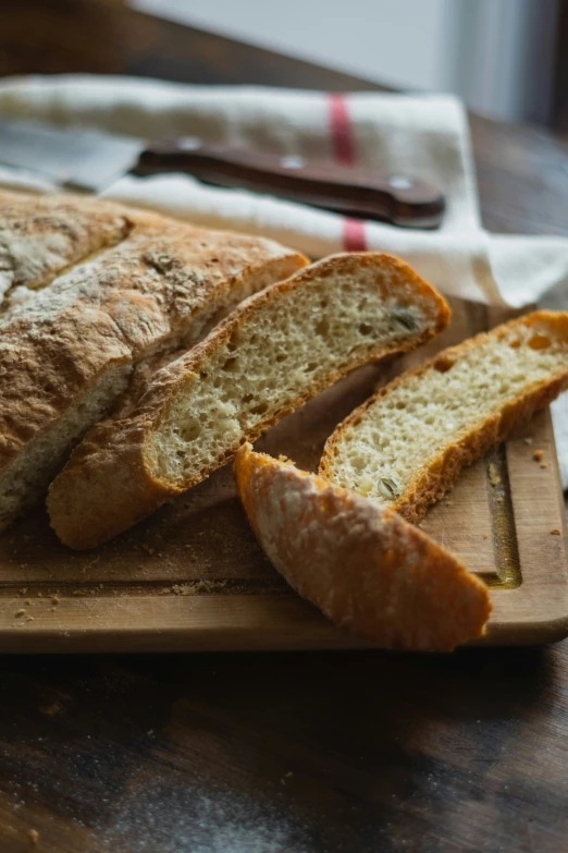 freshly baked sourdoughs sit on a  board