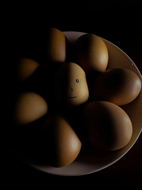 there are eggs in the bowl that have been made to look like an angel