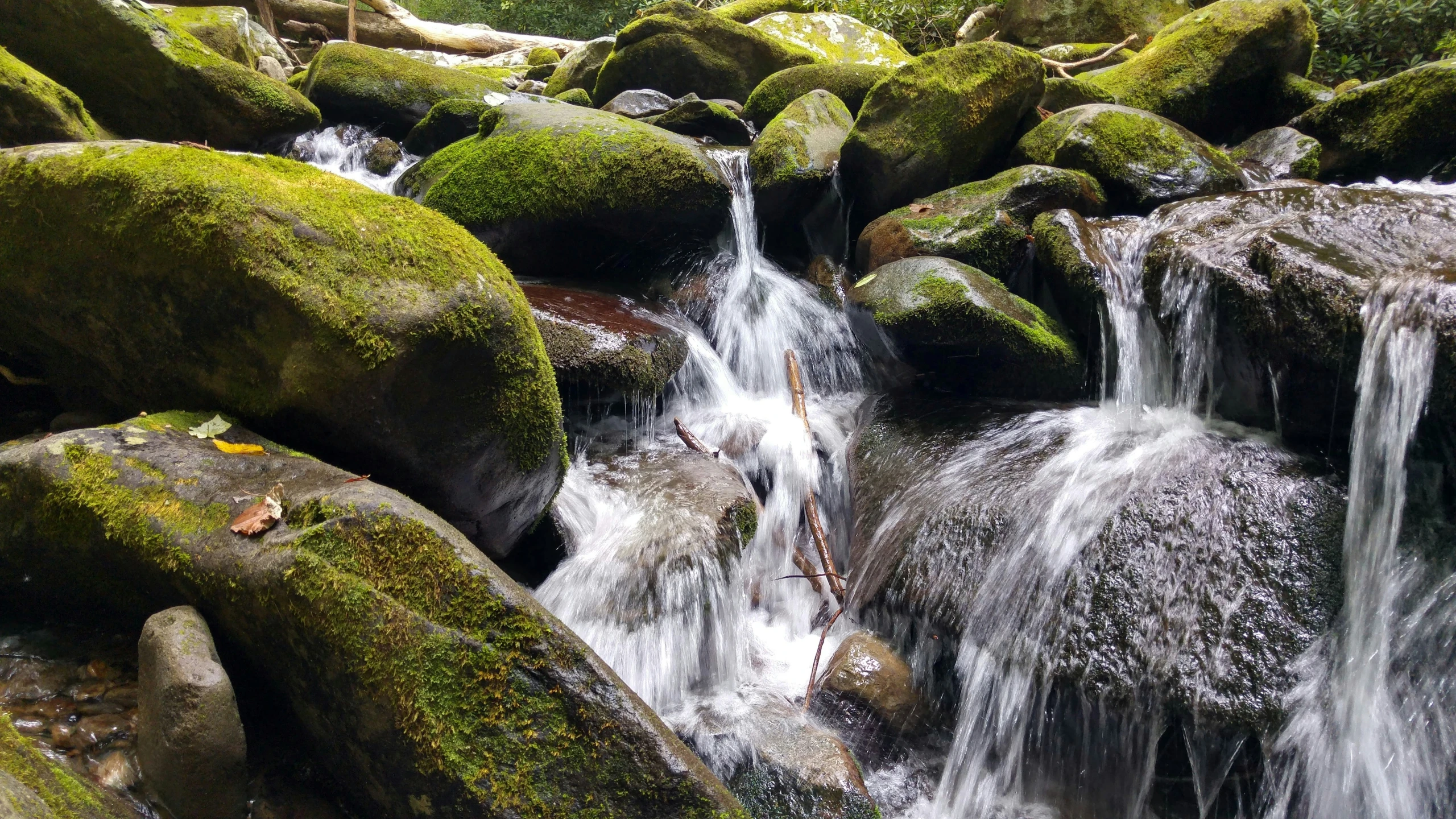 the water is running down the mountain like structure