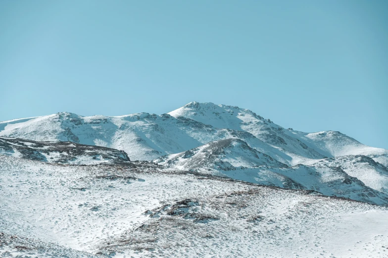 there is a snow covered mountain on this day