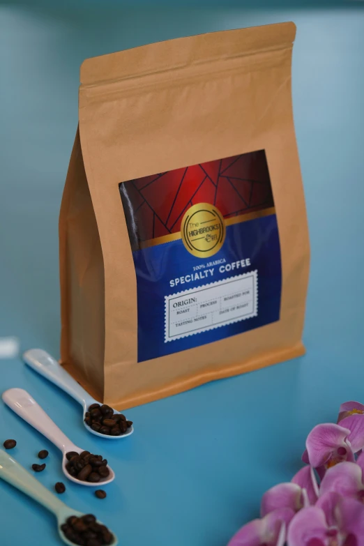 there is coffee beans in a small bag on the table