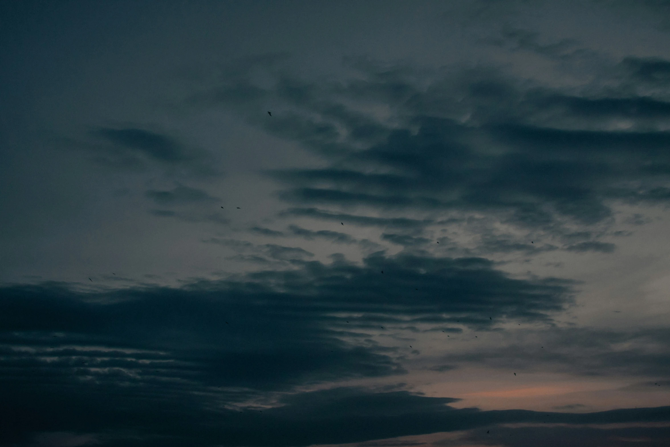 a couple of clouds that are in the sky