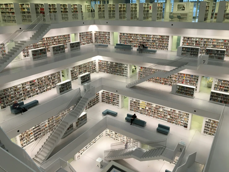 an overhead view of an empty liry with rows of books