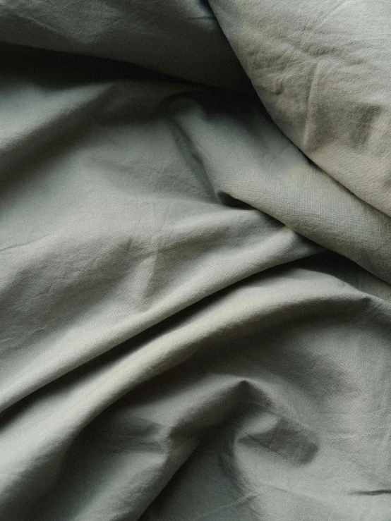 an image of a folded cloth on the bed