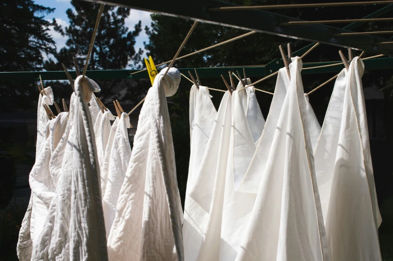 several different white material bags on a line