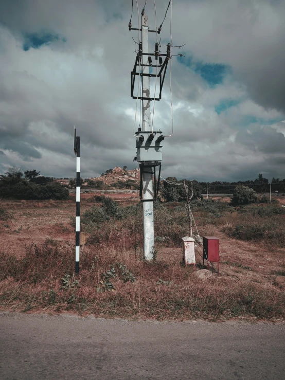 an antenna on a cloudy day with a red box