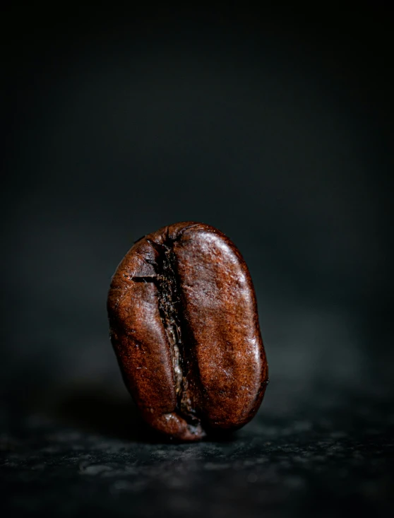 a coffee cup on a table with a bite taken out