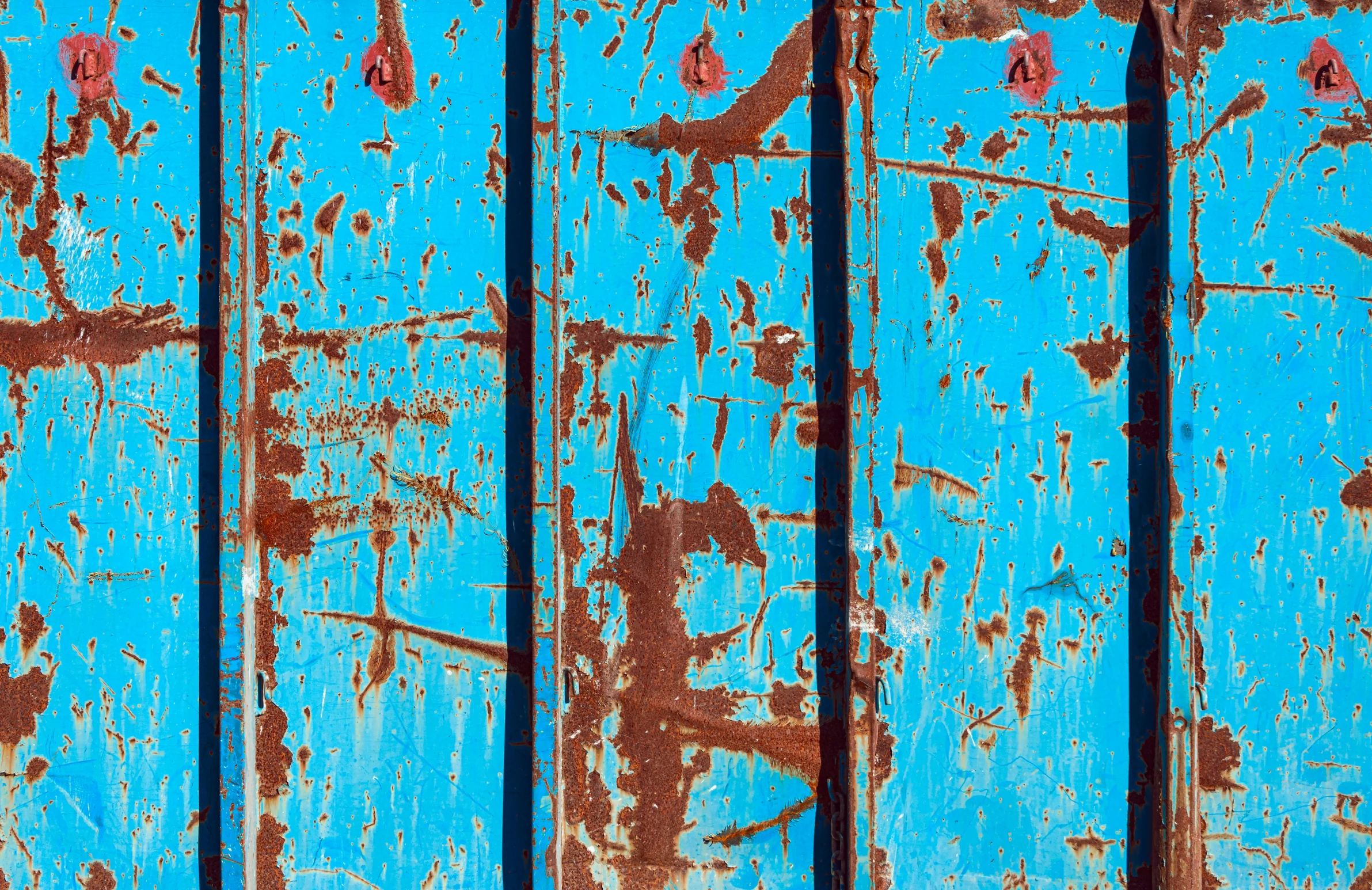 a blue background that appears to be rusted