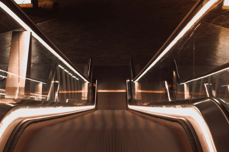 escalators in an underground metro station seen from above