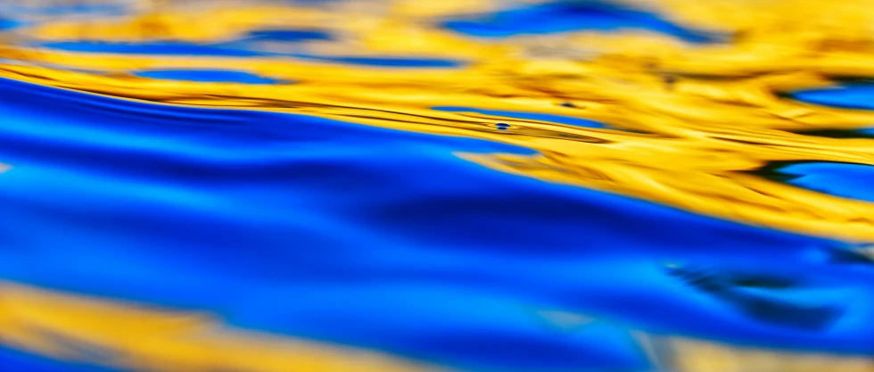 an artistic image with some bright blue waves