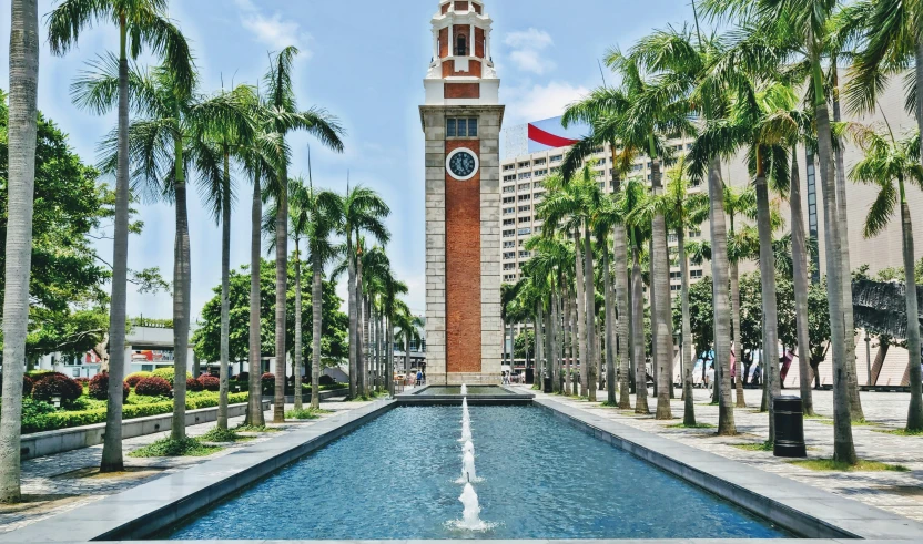 a clock tower on a very tall tower