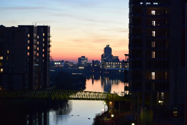 the skyline with several skyscrs in the background at sunset