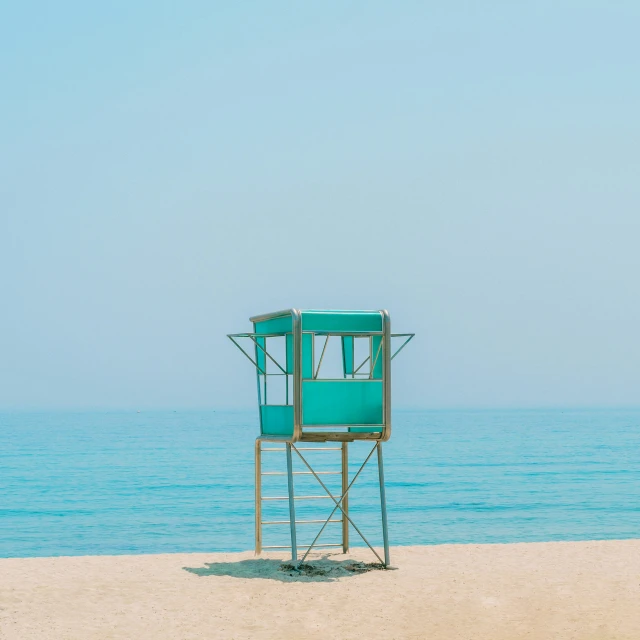 a life guard tower that is set up on the beach