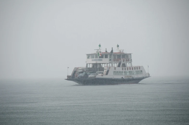 the large ferry has two stories on it's side