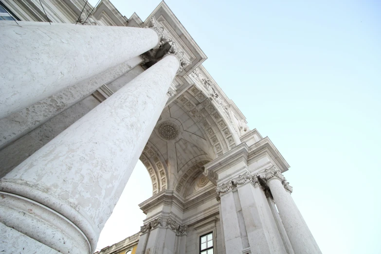 looking up at white marble structure of architecture