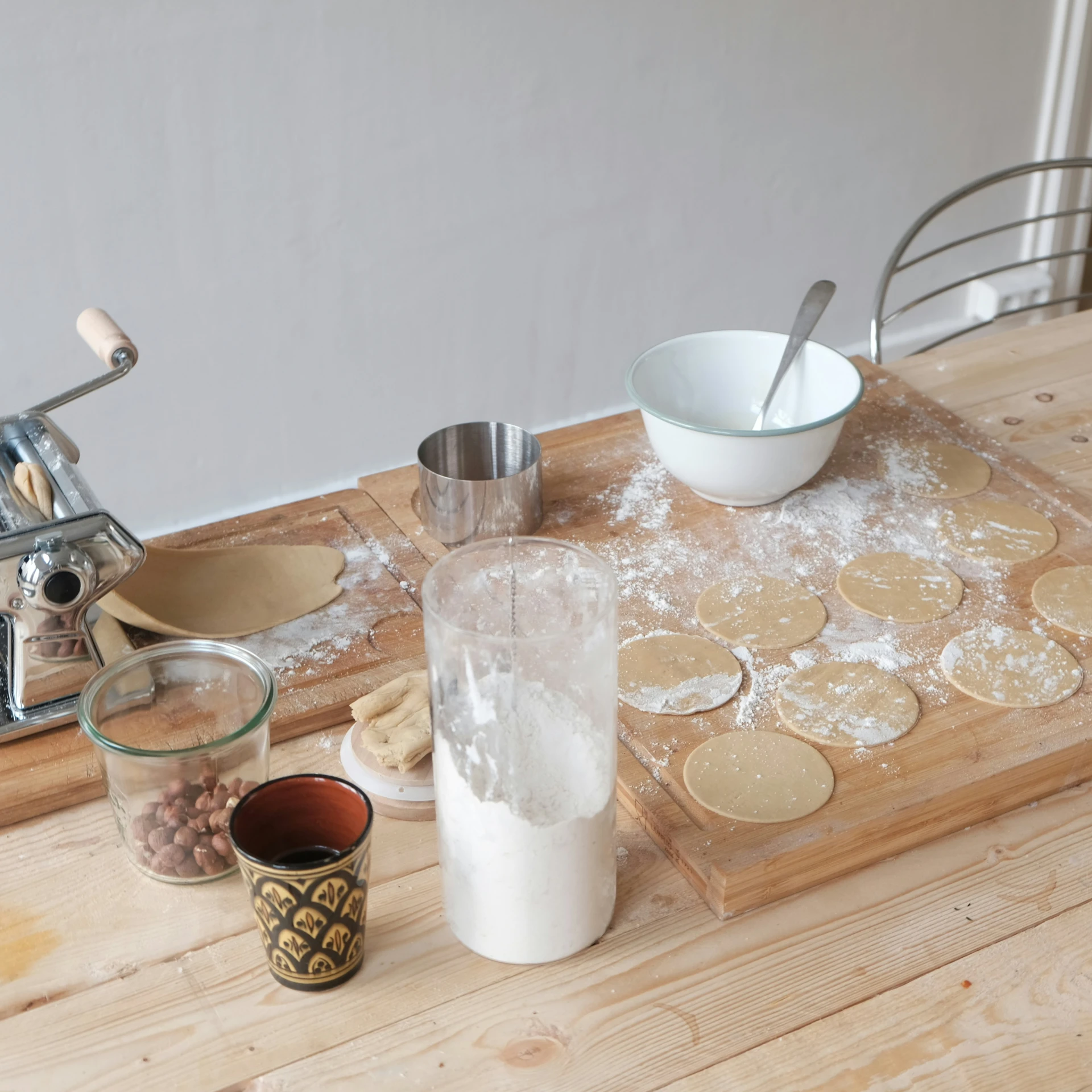 the ingredients needed to make cookies and er on a wooden surface