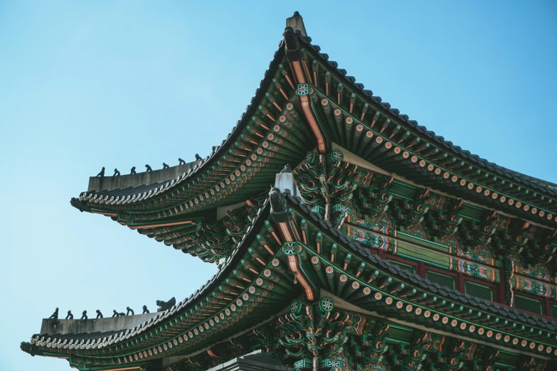 an elaborate structure sitting in front of a blue sky