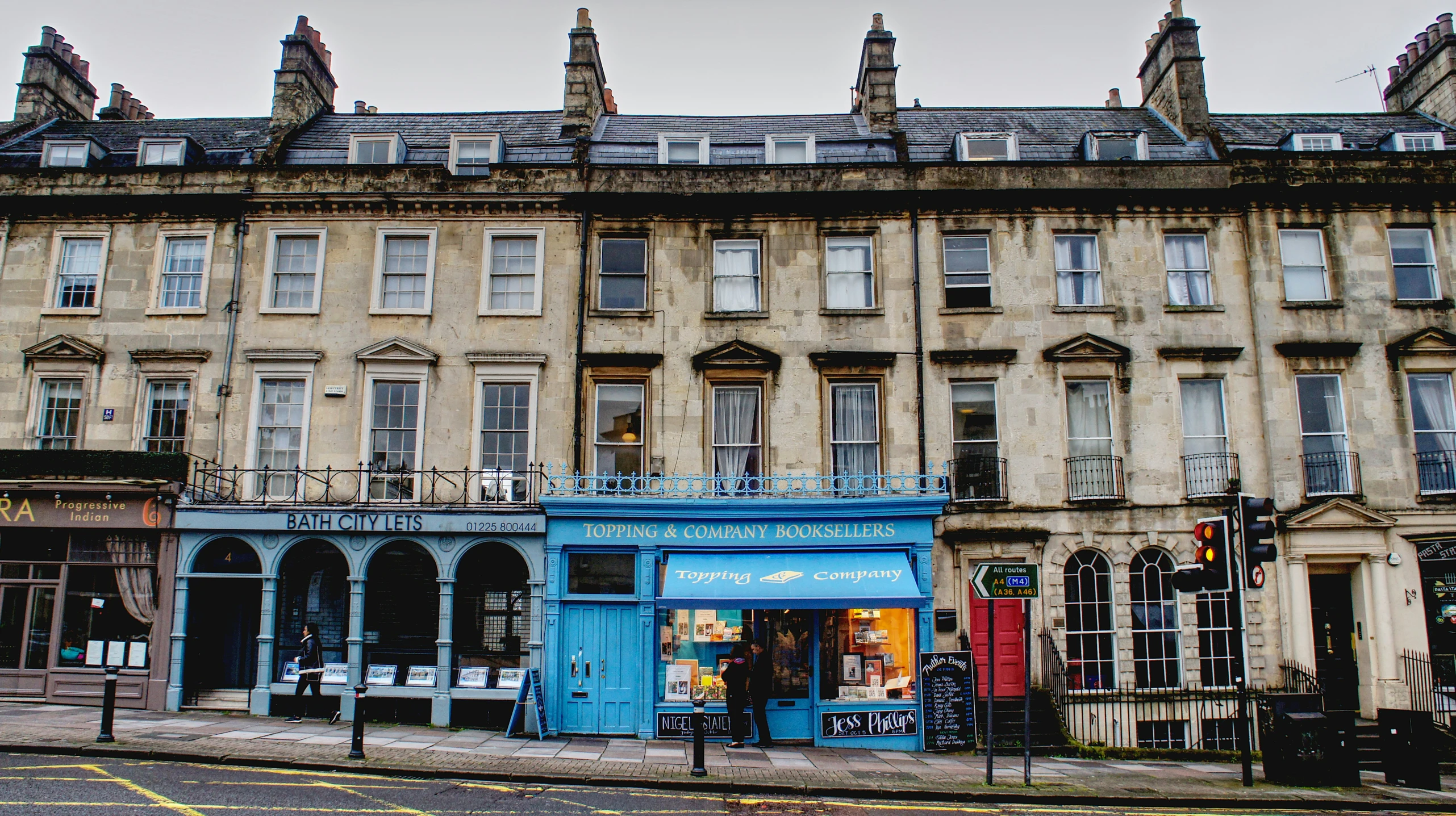 the corner street in front of an old building