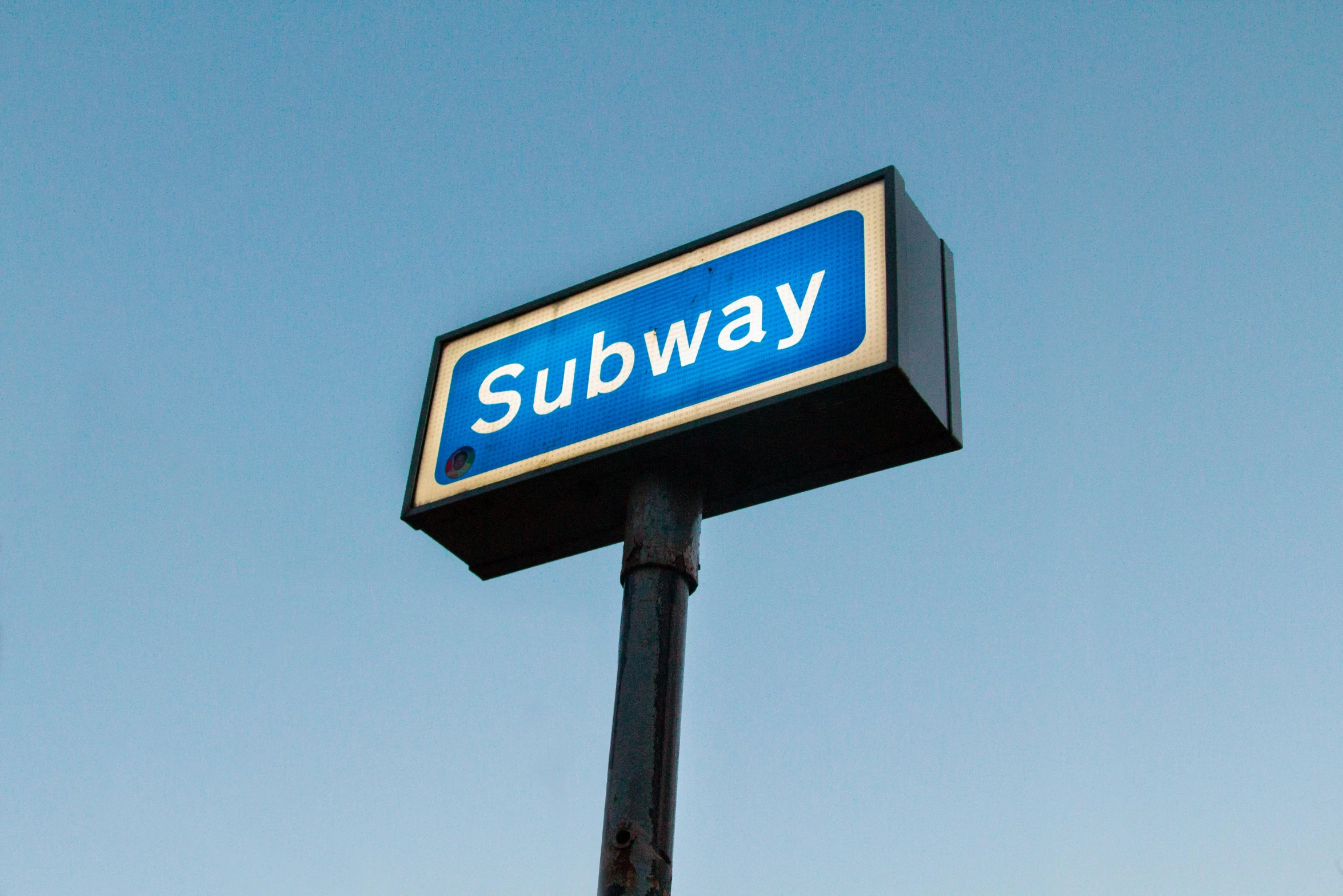 the subway sign has been changed to sign out subway