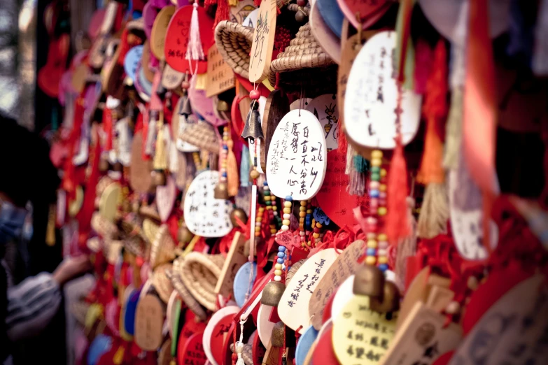 a wall of hearts with wishes written on them