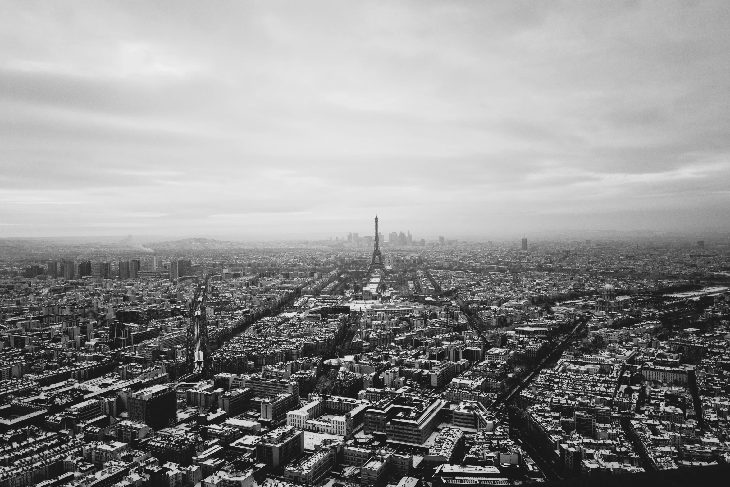 the black and white image shows a view of a city