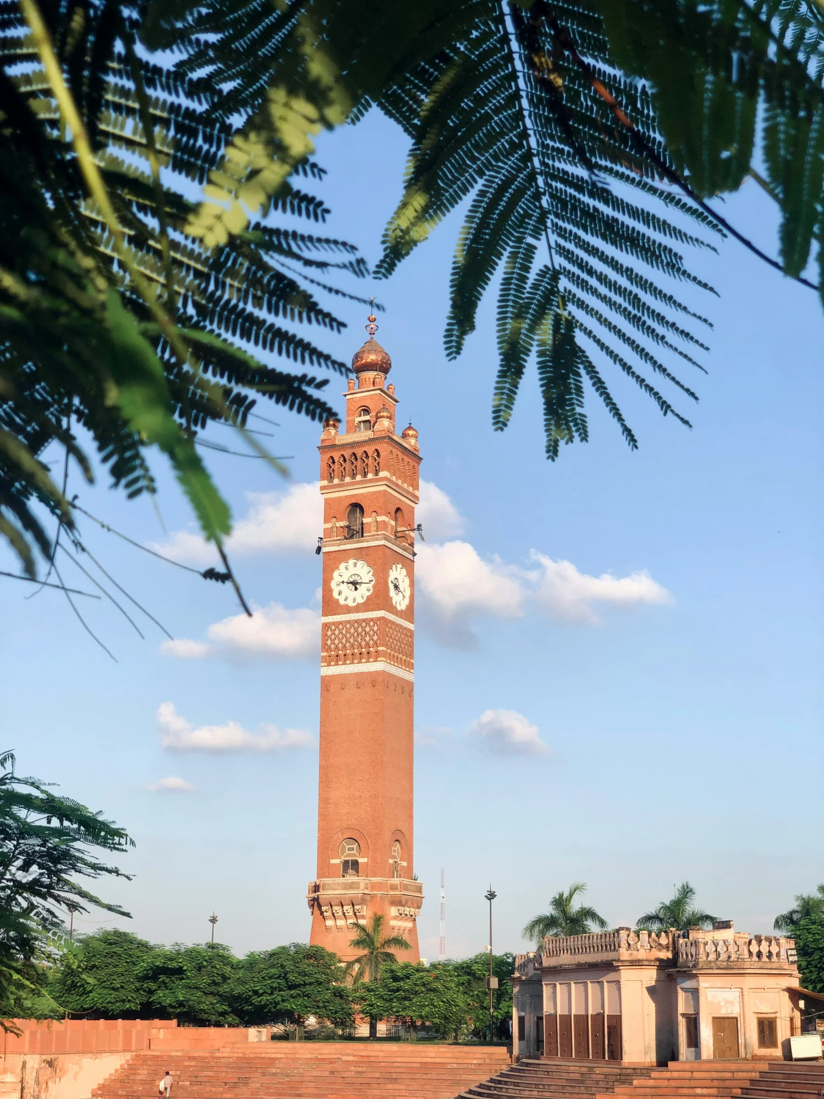 a tall tower with a clock on top of it