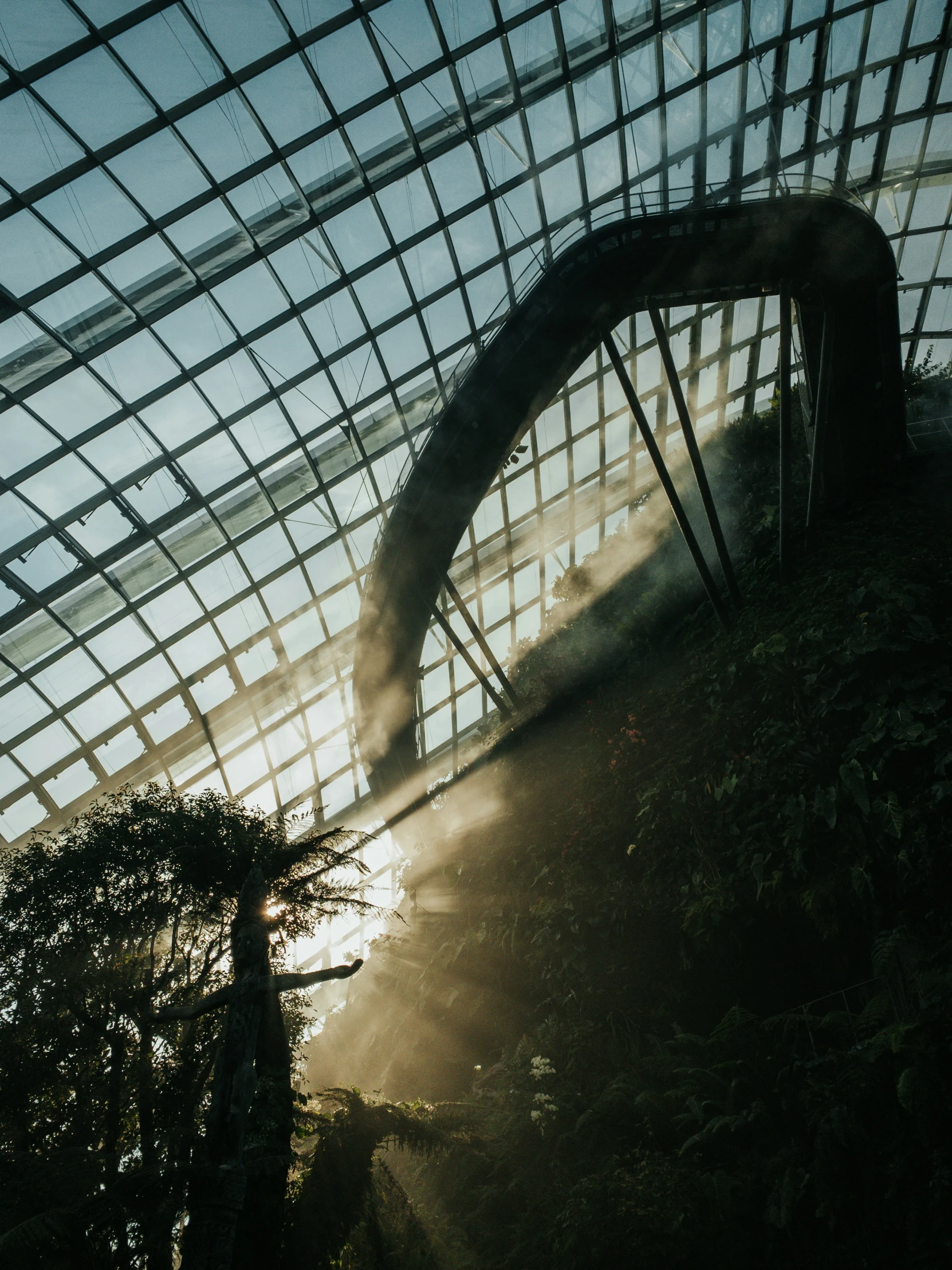 a greenhouse that has a pipe on the ceiling