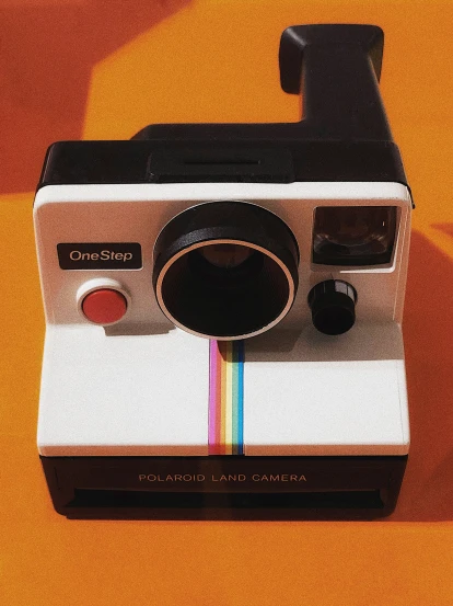 an old camera with its cover open