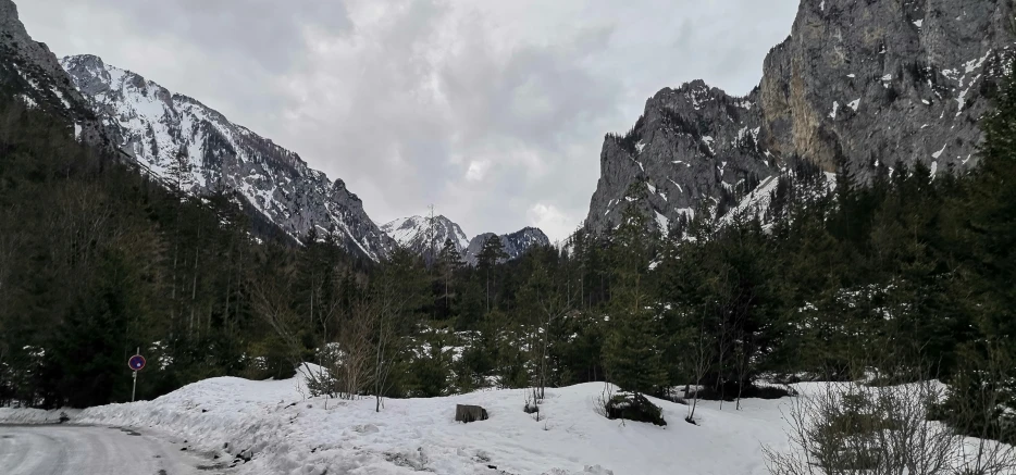 two very tall mountains with some snow on them