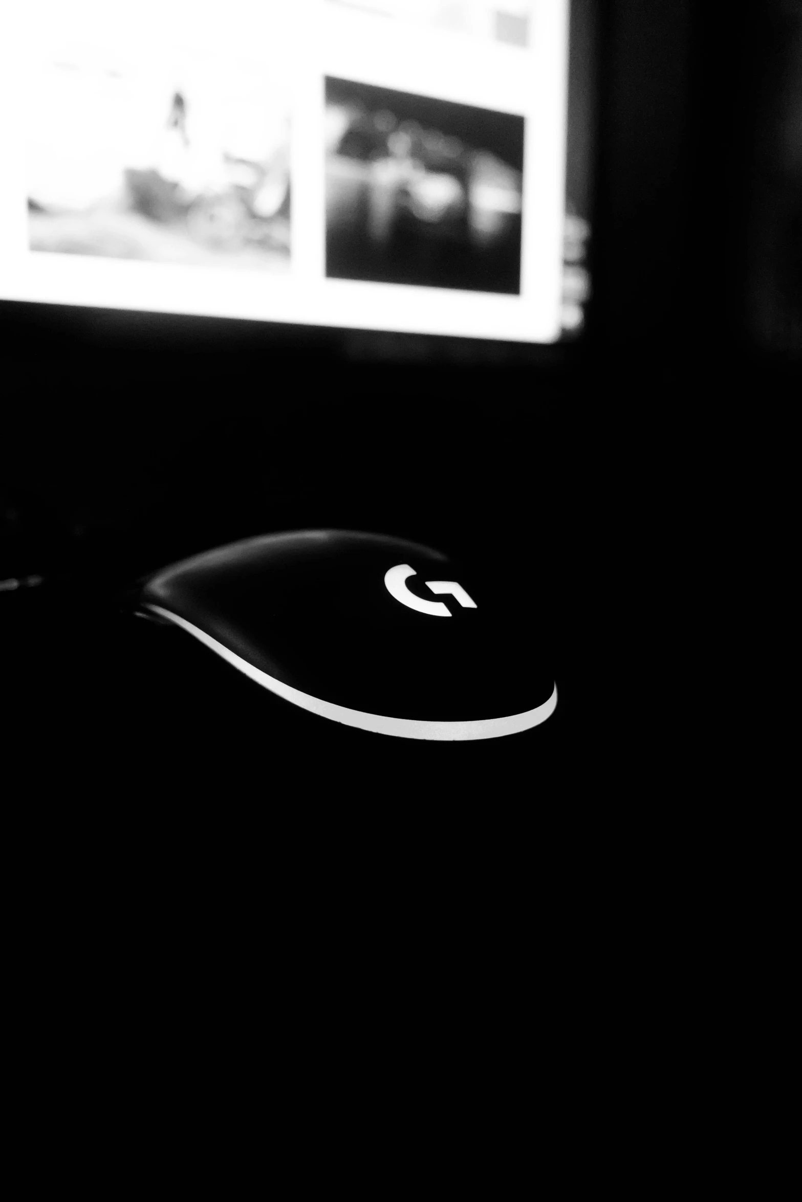 the computer mouse is left in front of the monitor