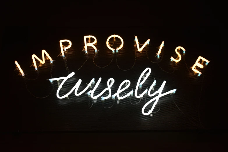 the sign for impossible and unusually lit up with light strings