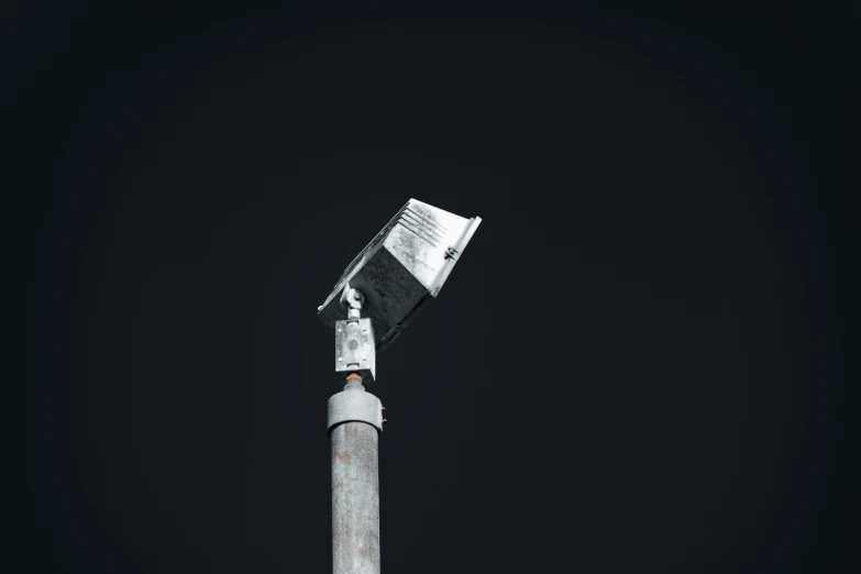 a street light with a sky background