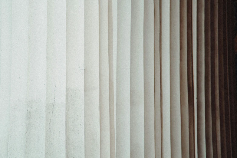 the close up of a row of open curtains