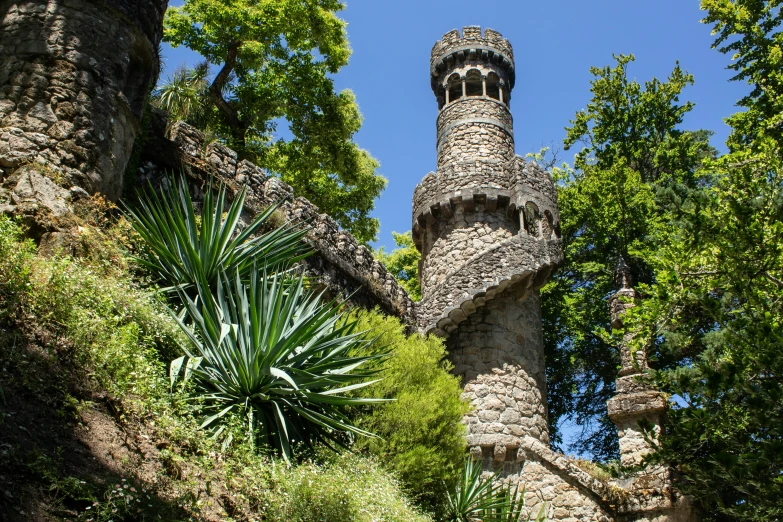 there is a stone structure near some trees