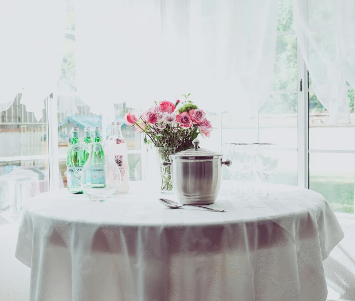 an image of a table setting with flowers