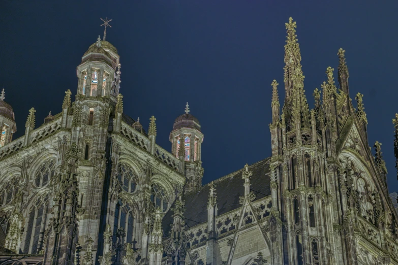 large cathedrals lit up against the dark sky