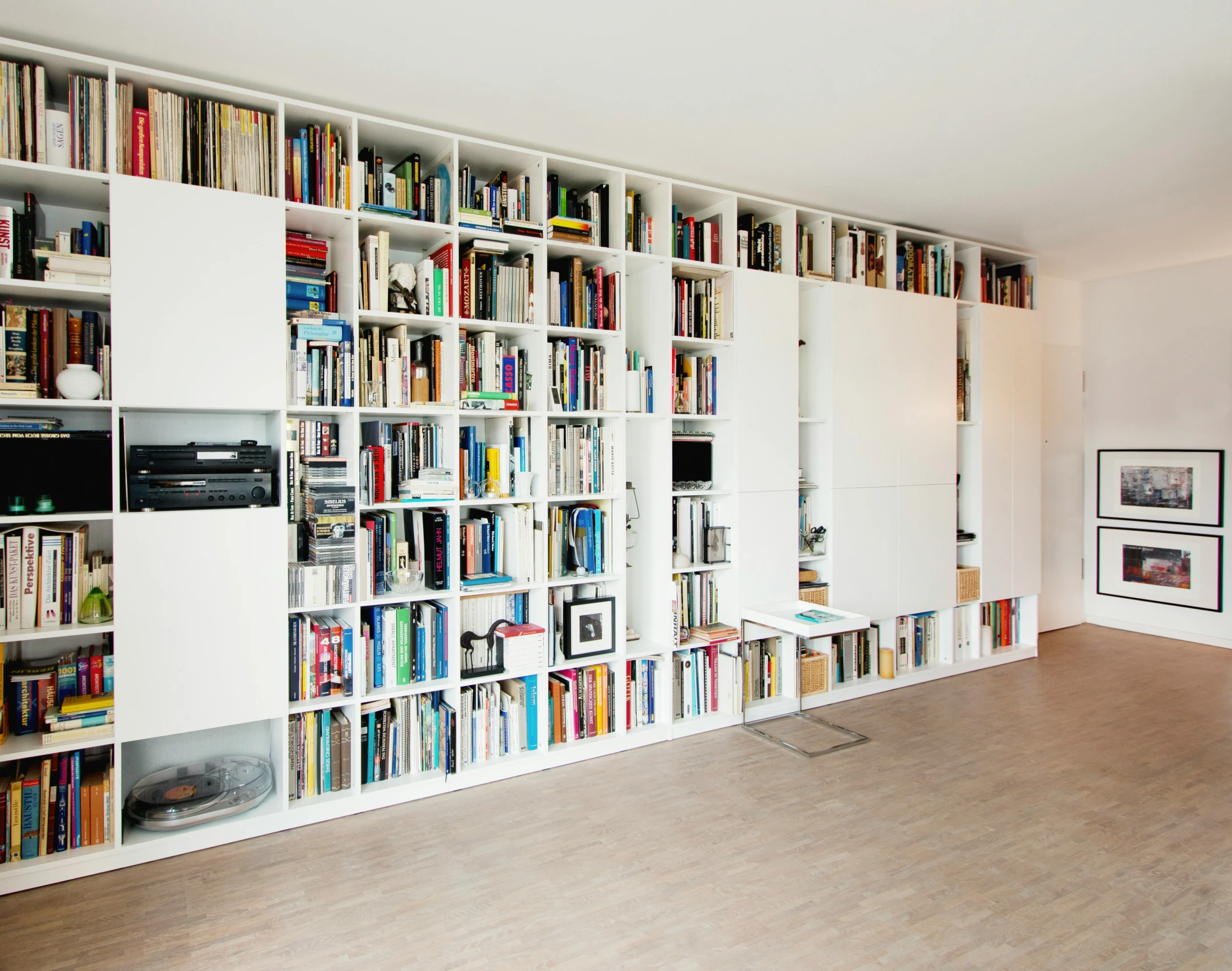 a full view of the bookshelves in the room