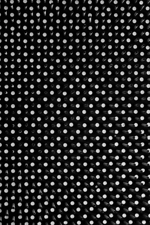 black and white po of many dots in the shape of a star
