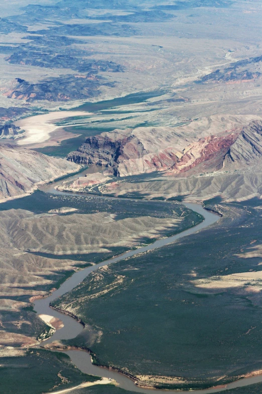 an aerial view of several rivers in a desert