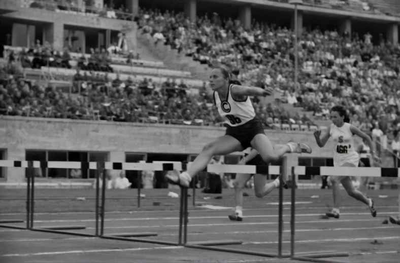 the competitors are running on the track in a competition