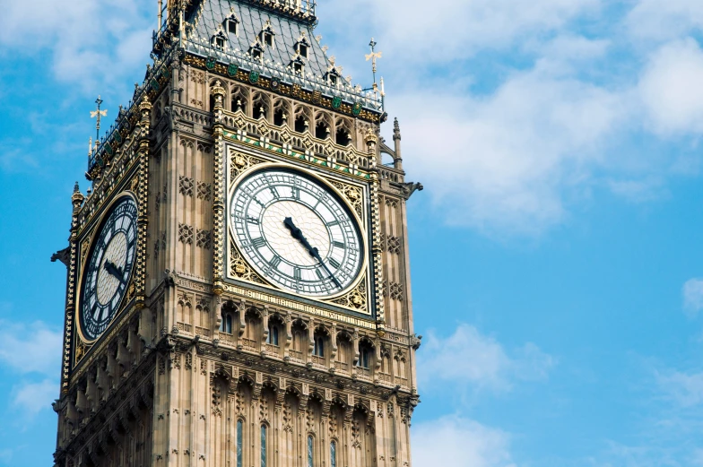 a tall tower with a clock on each side of it