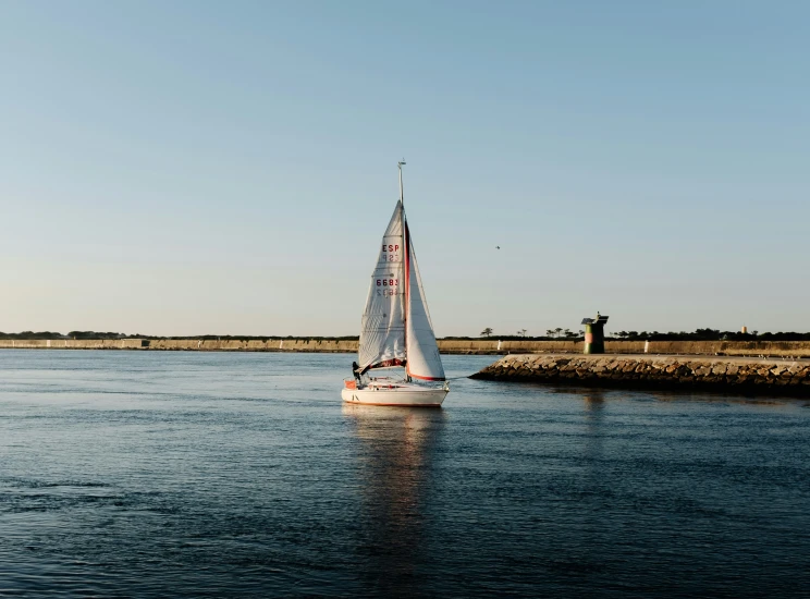 an image of a small boat floating in the water