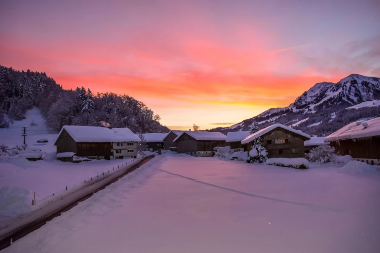 the sky in winter is very pink and yellow