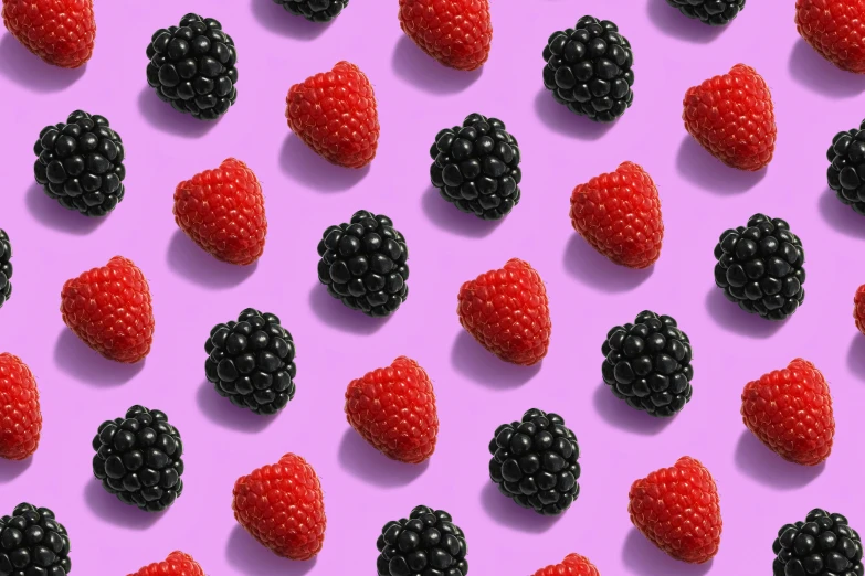 berries and other fruits laying on a surface