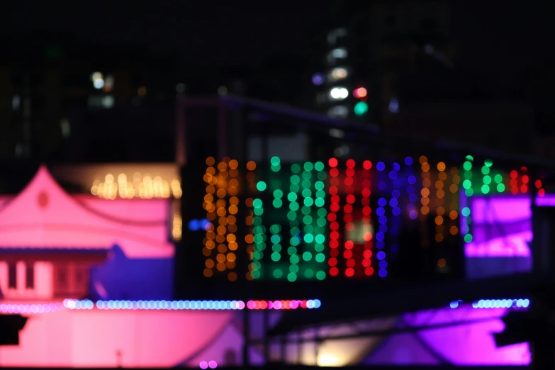 colorful lights shining on the city street