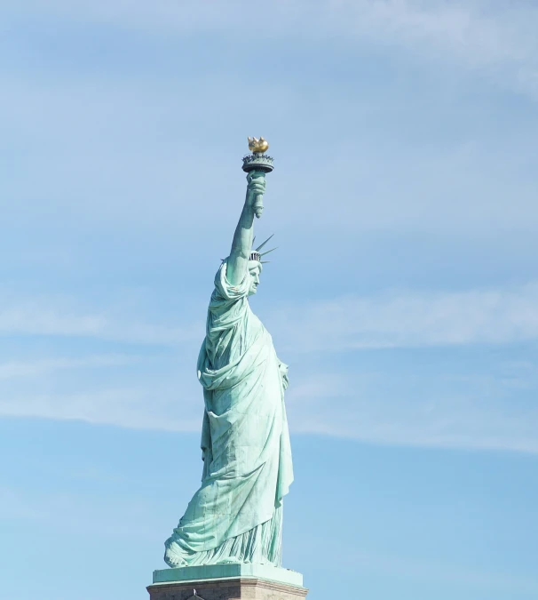 the statue of liberty as it stands on top of a pedestal