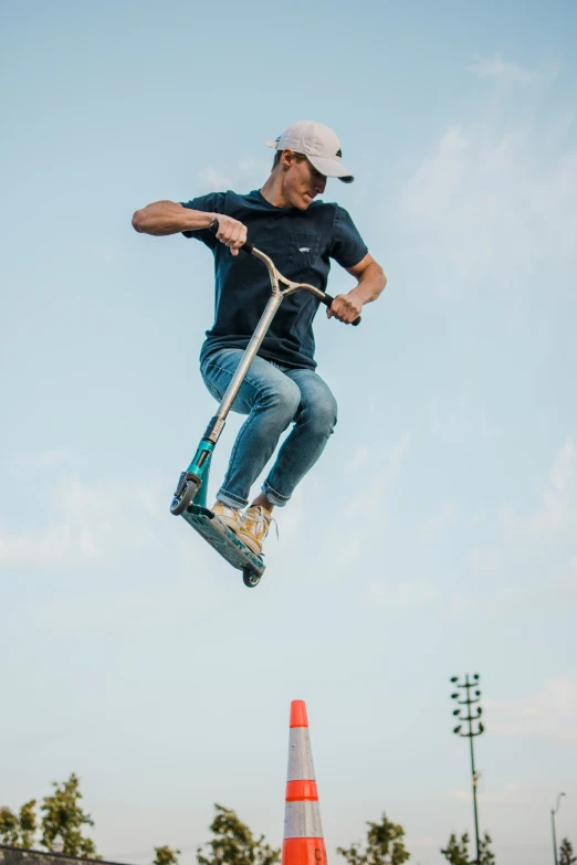 a man flying through the air while riding a skateboard