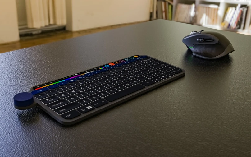 an image of a wireless keyboard and mouse on the table